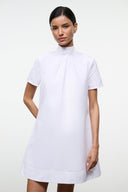 White mini dress close-up: high neck with pleats and short sleeves.