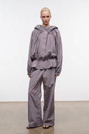 Zinc gray hooded rain jacket with drawstring waist and elastic cuffs