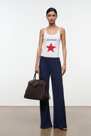 Navy wide-leg pants with relaxed fit and long straight silhouette