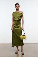 Phare silk dress, dark olive, one-shoulder drape, ruched waist; holds feather mini bag