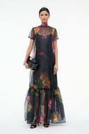 Black floral maxi dress with high neck, short sleeves, and ruffled tiered waist