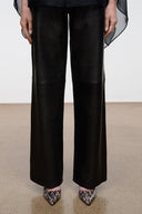 Black wide-leg trousers with SEBASTIAN porcupine quill slingback shoes, low heel