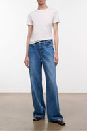 Relaxed vintage-wash blue jeans with wide straight legs