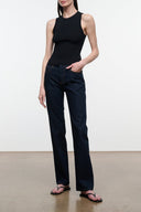 Indigo straight-leg jeans on model, dark wash denim with straight fit