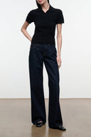 Relaxed indigo denim jeans with wide legs and front fly