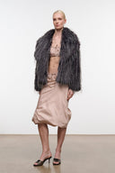 Dark gray shag fur jacket on model, straight open front, long sleeves
