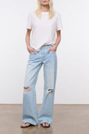 Salt-wash distressed relaxed jeans in light blue with wide straight legs