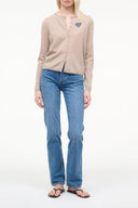 Stone cashmere cardigan with button front and small embroidered logo on chest
