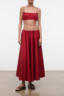 Rouge red high-waist midi skirt, gathered drape and flared hem