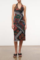 Beaded midi pencil skirt with dark floral patchwork pattern and scalloped hem