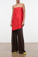 Red strapless convertible silk dupioni top with draped neckline and asym hem