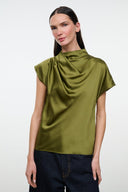 Front view of olive satin silk top with high collar and short sleeves, draped neckline