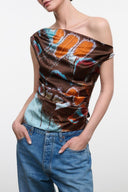 Silk off-shoulder top with abstract brown, orange, and blue print