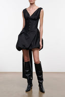 Black sleeveless silk mini dress with V-neck and corset-style waist seams, ruched skirt