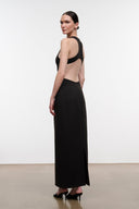 Back view of sleeveless long maxi dress with racerback straps, fitted dark silhouette