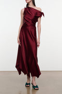 PORTIA silk dress in dark red satin with one-shoulder drape and midi hem