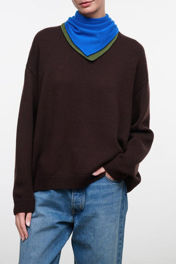 Dark brown knit sweater with ribbed V-neck and long sleeves, relaxed fit