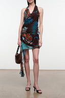 Butterfly-print mini skirt with draped front and asymmetrical hem