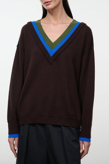 Dark brown V-neck pullover sweater with blue and green striped trim at neckline and cuffs