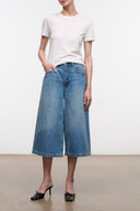 Denim culotte jeans in light blue wash with wide legs and mid-calf length