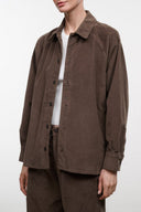 Dark brown corduroy shirt jacket with button front and stand collar