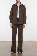 Relaxed fit brown corduroy jeans with wide straight legs and button waistband