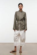 Olive linen zip-up jacket with stand collar, patch pockets, and drawstring waist ties