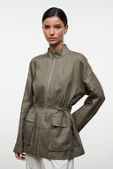 Olive linen zip-up jacket with stand collar, drawstring waist, and patch pockets