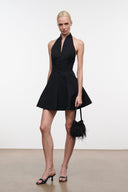 Black halter mini dress with V neckline and flared skirt, sleeveless