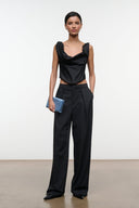 Black silk top with cowl drape at neckline and gathered shoulder details