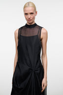 Black sleeveless high-neck mesh overlay dress with draped knot detail at waist