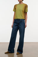 Relaxed-fit dark blue jeans with wide straight legs and stitched front pocket details.