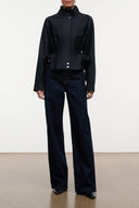 Indigo wide-leg jeans with front button closure and five-pocket styling