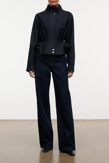 Indigo wide-leg jeans with front button closure and five-pocket styling