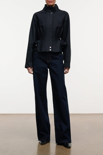 Black zip-up jacket with stand collar and chest pocket details