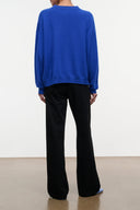 Black wide-leg jeans with elastic waistband, back view