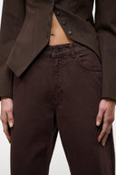 Dark brown high-rise jeans with button closure, belt loops, and front seam