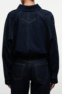 Indigo denim shirt jacket back with yoke seam and long sleeves, button cuffs