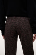 Dark brown leopard-print straight jeans with back pockets and stitched waistband detail