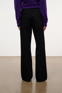 Relaxed black jeans back view with wide legs and stitched waistband