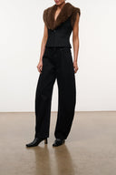 Jet black barrel-leg jeans with relaxed silhouette and wide hem opening