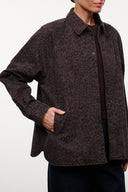 Myles shirt jacket close-up: dark brown leopard print, button placket, long cuffed sleeve