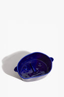 Henry blue ceramic small dog bowl with embossed paw pattern inside