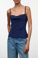 Navy silk camisole top with lace-trim neckline and thin spaghetti straps