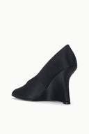 Black satin wedge heel shoe, sculpted wedge and smooth peep-toe front