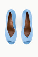 Pair of sky-blue peep-toe wedge heels with open toe and woven-look insole