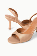 Cashew heeled slingback sandal showing open toe and adjustable ankle strap