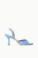 Light blue satin slingback heeled sandals with open toe and slim heel