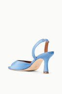 Light blue satin open-toe slingback heels with mid-height block heel