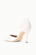 White pointed-toe stiletto heeled sandal in angled side view, open back